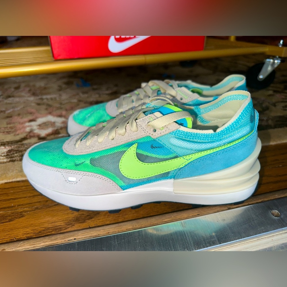 Neon blue and green Nike sneakers